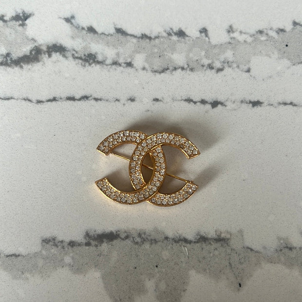 Chanel gold rhinestone brooch